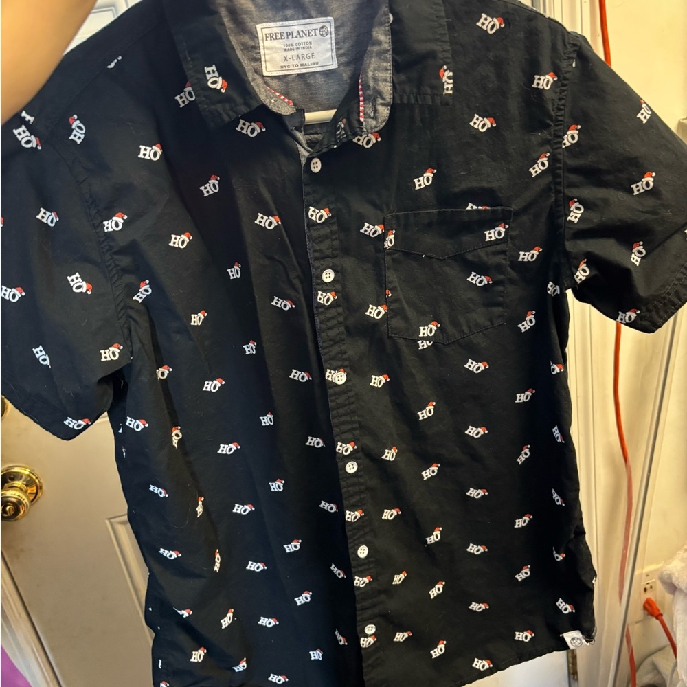 Free Planet Black Short Sleeve Button-Down Shirt with White and Red Accent Print